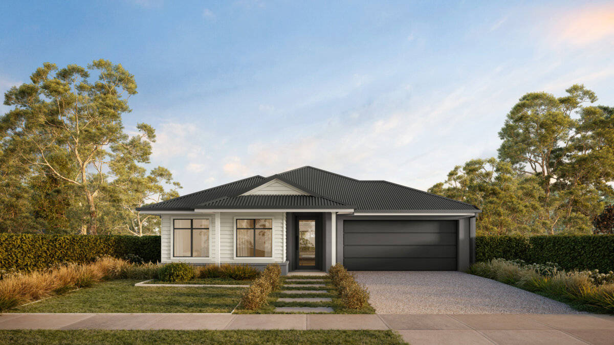 Wide view of a contemporary home exterior with large windows and a landscaped yard.